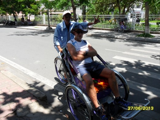 Kevin with our cyclo driver. 