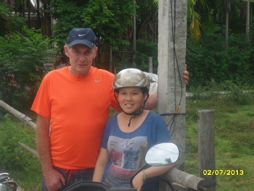 Kevin with Vang at her block