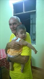 Kevin nursing Ruby, Dong's daughter at warm house party. : by wendyandkevin, Views[469]