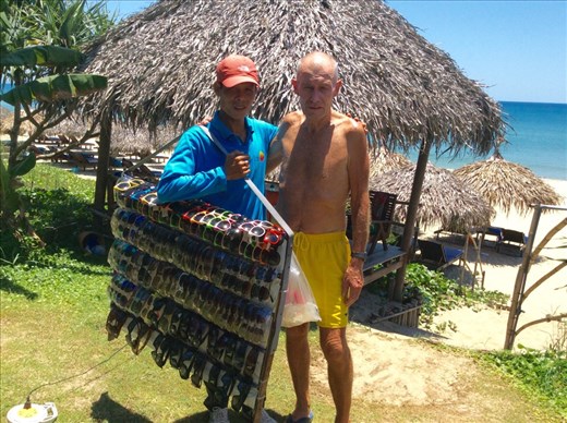 Kevin with Banyan the best sunglasses vendor in An Bang