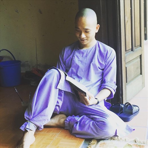 Monk in training doing his morning reading near Monikas house