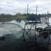 Fishing net and hut where men sleep at night to watch the nets: by wendyandkevin, Views[441]