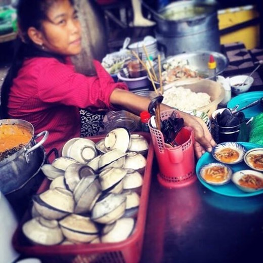 Lady selling clams