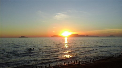Cua Dai sunrise over Cham Island