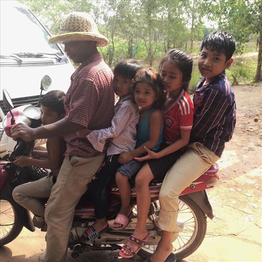 A common sight of family off on an outing. 