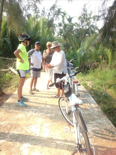 Monika explaining the rice harvesting. 