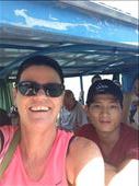 Tri and me on boat back from Phong Nha Cave: by wendyandkevin, Views[213]