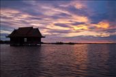 Being graced by the sun setting behind a buddhist temple at Kompong Pluk.: by wez7, Views[203]