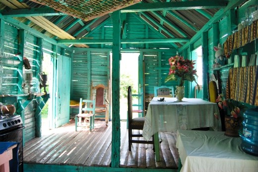 A modest home of a family who is still working on cocoa farms in the traditional way