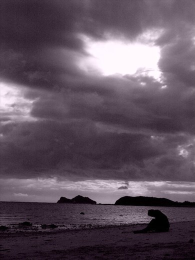 Beach of Koh Phangan, where full moon parties held, this thoughtful moment of a girl..