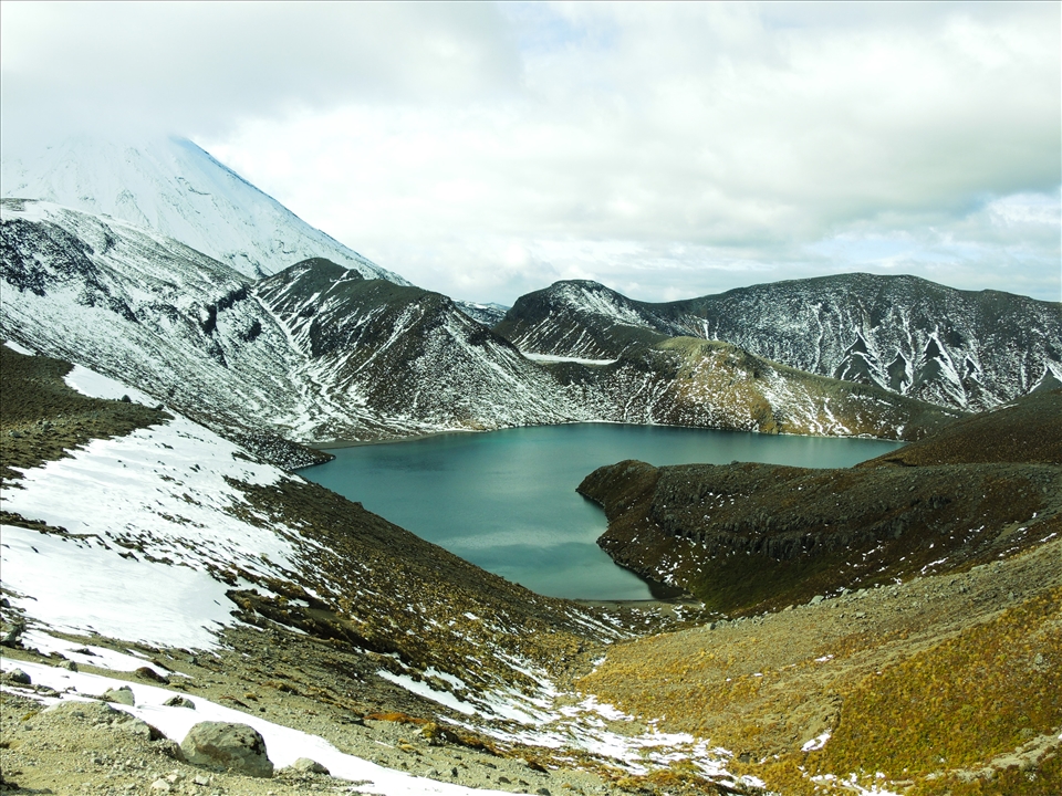 Clouds shrowd Mt. Ngharahoe with Upper Tama Lake at it's base.