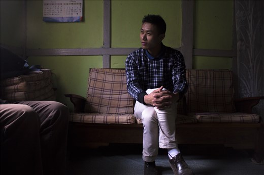 Concierge of my hotel, but tour guild to me. Avito sitting in his Aunt's house waiting for tea.