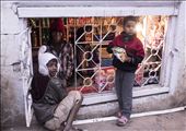 In Kohima India, children working in the family store while visiting friends stand on the outside looking in.: by whenrhinosappear, Views[273]