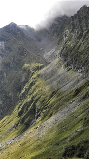 We walk on the edge to reach the summit.