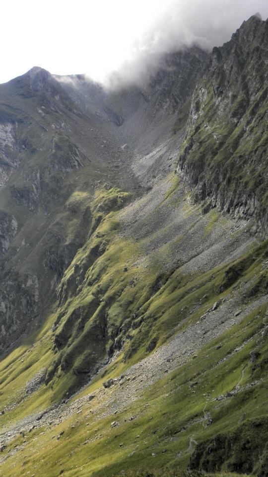 We walk on the edge to reach the summit.