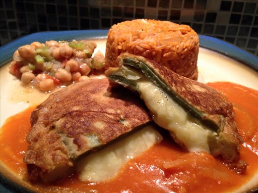 Plate and serve the stuffed cactus with the warm sauce.