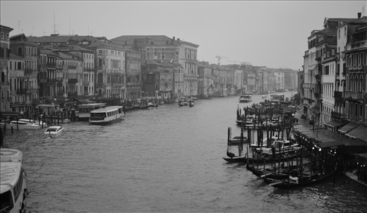 The Grand Canal dominates the Floating City. Lined with piers, moorings, and every form of vessel imaginable, Venice's arterial waterway is a bustling freeway of life. The Gothic buildings appear impossibly buoyant as the mild wakes of passing boats lap against their foundations. 