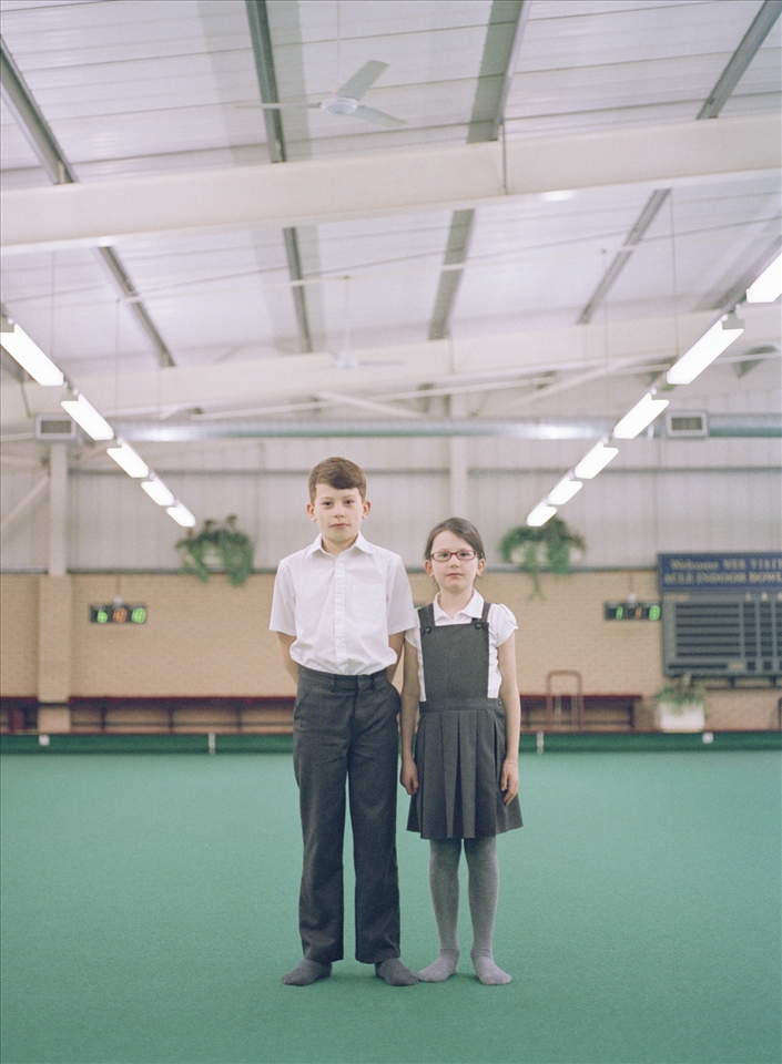 These two members, aged 5 and 7 were introduced to bowls at their primary school. A portrait of Acle Indoor Bowls Club. Shot on Mamiya 645, with the aid of natural lighting and a tripod. 