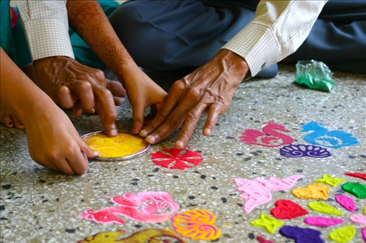 I chose to study abroad in Varanasi, India for several reasons. It is one of the oldest living cities in the world and the holiest pilgrimage site in Hinduism. Before coming I knew I would get to partake in Diwali…the festival of color and lights. This is a picture of my host father and sister creating a Rangoli for the festival. Diwali is the celebration of Rama's coming, and signifies the victory of light over darkness. It is celebrated by the marriage of Ganesh-ji and Lakshmi. The Rangoli is a sand drawing created as a sacred welcoming for Lakshmi to enter the home and bless all inside. While the festival preparations extend over a period of five days, the main celebration coincides with the new moon (literally light vs. the dark). I was fortunate enough to celebrate this day with my host family because while so much of the visual beauty is outside, the sacred rituals are done in the home. Watching the older generation pass ancient traditions on to the new generation was something to behold. 