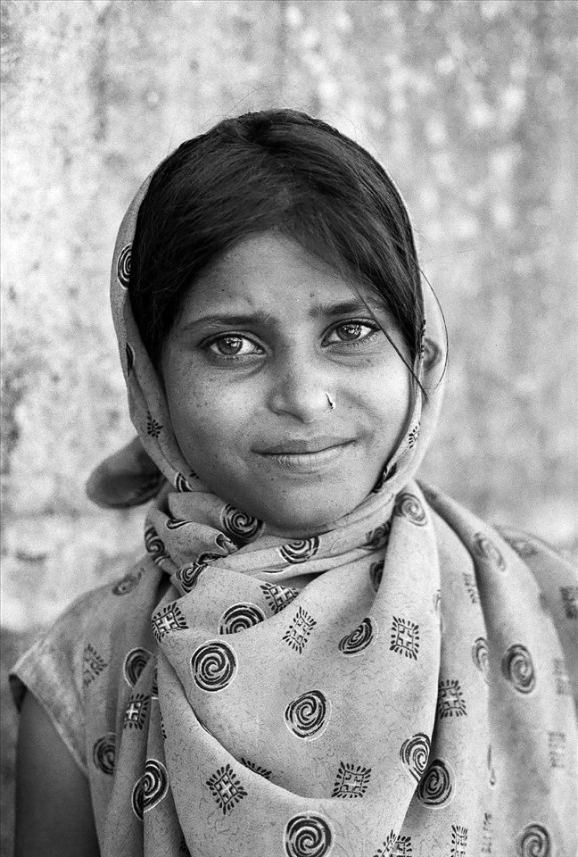 A rare smile, a facade for this beggars anguish.