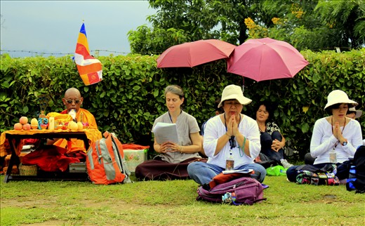 The Prayers - Several followers of Buddha and Monk chanting their prayers