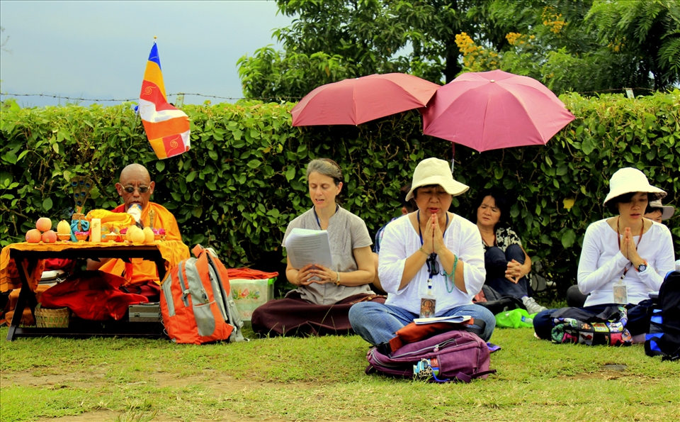 The Prayers - Several followers of Buddha and Monk chanting their prayers