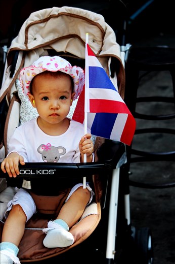 Fighting for what I believe in is work too.

During 2014 January Thailand had an Anti-government protests. On my trip I had the privilege to walk through the protest near Siam Centre and capture true beauty. My favourite of all 800 Protest photographs was this amazing young girl. Her innocence in such chaos was pleasant.      