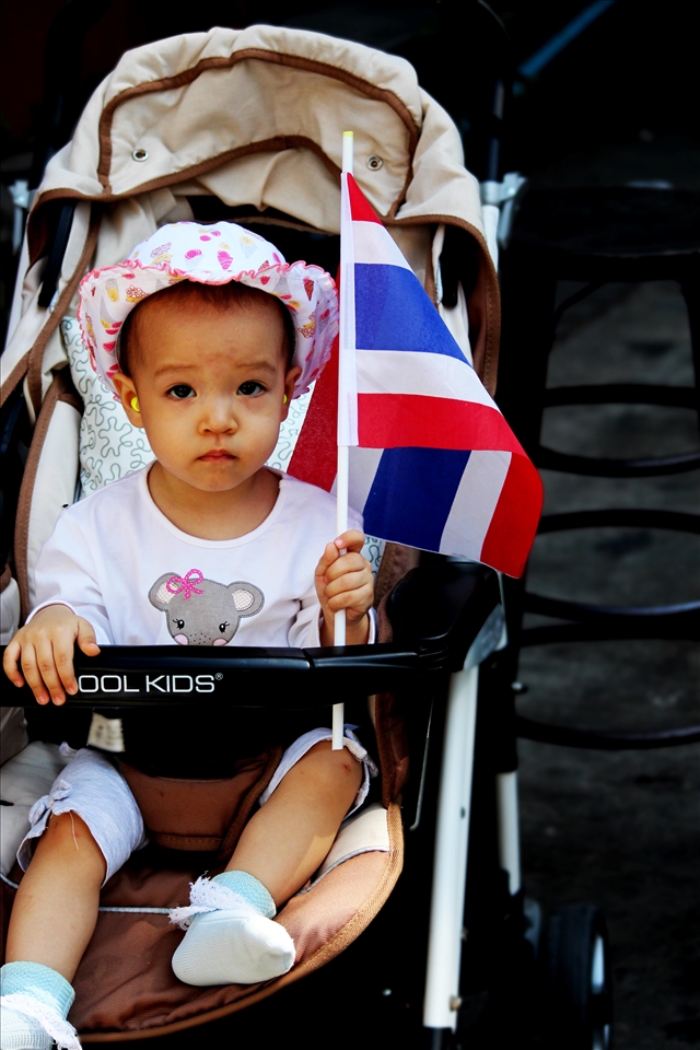 Fighting for what I believe in is work too.

During 2014 January Thailand had an Anti-government protests. On my trip I had the privilege to walk through the protest near Siam Centre and capture true beauty. My favourite of all 800 Protest photographs was this amazing young girl. Her innocence in such chaos was pleasant.      