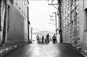 Streets for everyone and everything, as in Santiago de Cuba. Also the street that becomes soccer pitch for youth. One ball, two self made soccer goals built in wooden, and then, all together in the street!: by workinindonesia, Views[655]