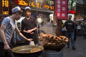 For more than 3,000 years Xi'an has been a hub of Chinese civilization. Today, the streets in the city's Muslim Quarter come alive at night with vendors and the smell of fried foods like pig feet.  : by worldnomads_scholarship, Views[478]