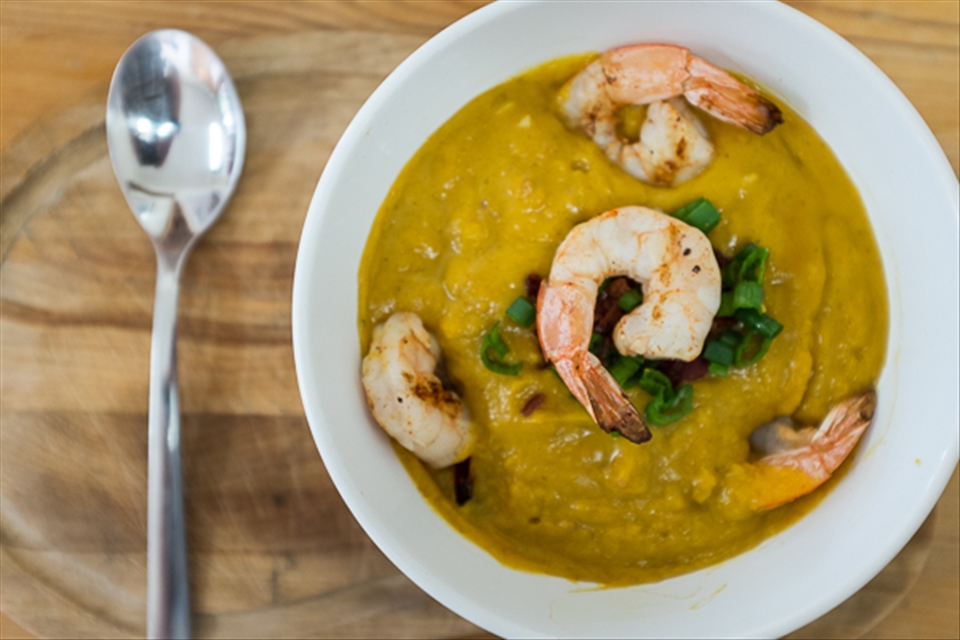 The final product with bacon, green onion and a prawn on top.