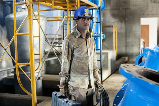 Portrait of a worker in the construction site.