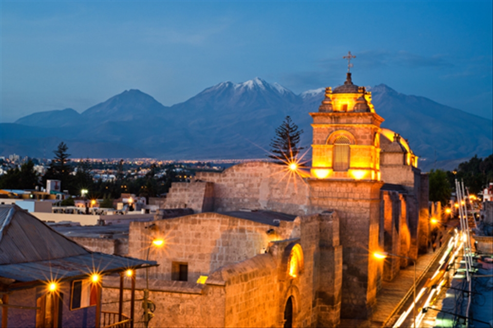 Misty volcano behind the Catalina Convent in Arequipa, Peru