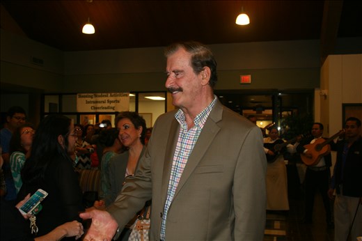 Former President of Mexico Vicente Fox shakes the hands of supporters.