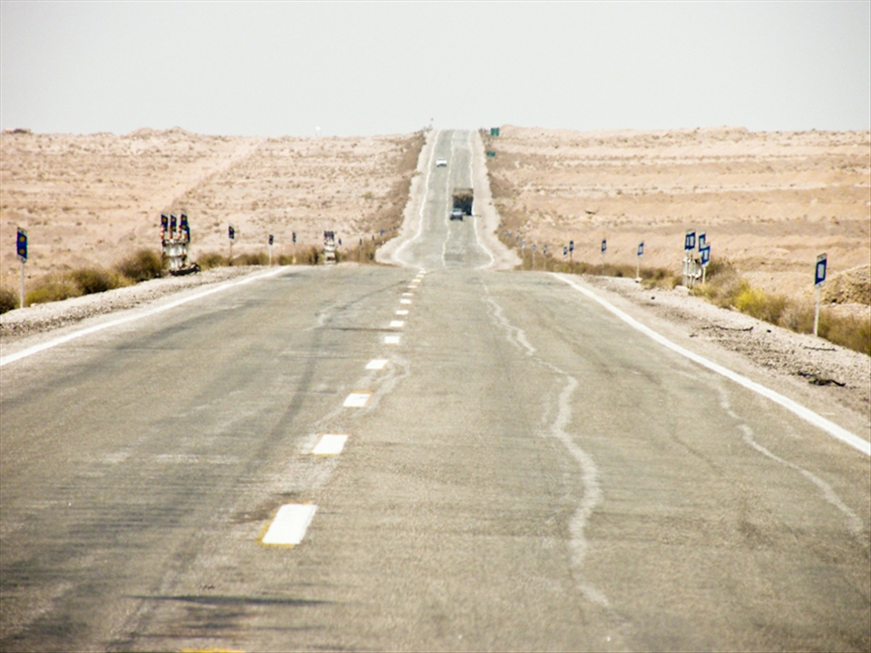 Travelling through the desert for hours from Esfahan to Yazd, or from Persepolis to Shiraz is an amazing experience. Lots of mountains can be seen, little villages in the middle of nowhere, and military complex surprise you during your trip. 
