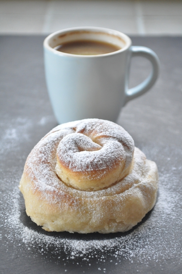 Frehsly baked ensaimada, dusted with icing sugar, and eaten with espresso... Mallorca recreated!
