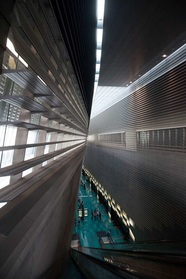 Stadium' MRT station. The architecture and design of public venues in Singapore represents and communicates power and authority. It depicts the relationship between government and citizens. Transformation of the landscape is like re writing history in both intellectual and emotional terms. Color, surface, texture, proportions and dimensions become symbols of high status, great wealth and overarching authority