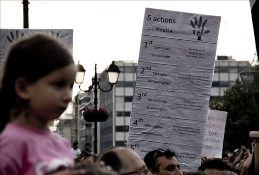 Demonstrator's demands. During the biggest protest of Greece's recent history.