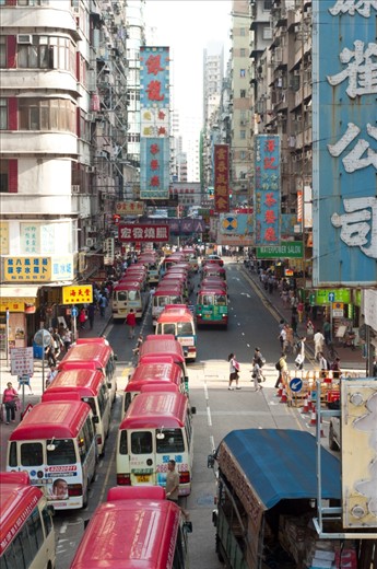 In a city of contrasts, the bus station couldn't be anything but a mess in a crowded street. Try to find the correct bus here!