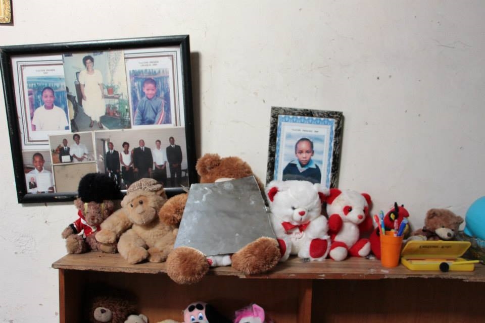 Photos and toys of the kids that Dina takes care of.