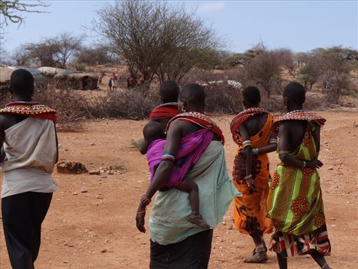 A MAN'S WORLD - After being greeted by the tribe, the women depart. The men are about to have a meeting to discuss the future of the tribe. Women are not allowed to participate.