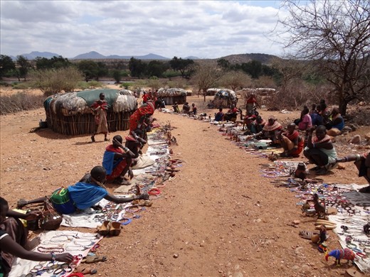 REALITY - The people of Samburu were among the friendliest people we met while in Kenya, but the sad reality is that they still need to sell items to get by. You wish you could help everyone as you walk past them and their short huts. The hardest part about saying goodbye to the tribe was having to say 'no thanks' and 'sorry' to so many of them as we head back to the van.