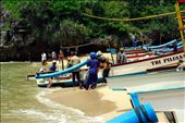 fisherman back from sea in the morning. one boat can hold 2-5 fishermans. when they made to beach, the other people may to help the to up the boat to the land.: by yes, Views[336]
