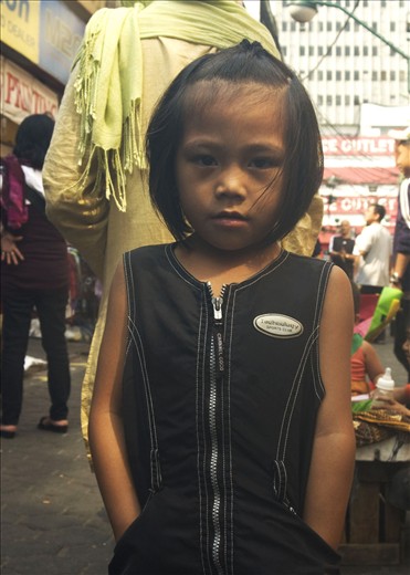 Casting a shadow of darkness upon men's children. (Quiapo, Manila, Philippines)