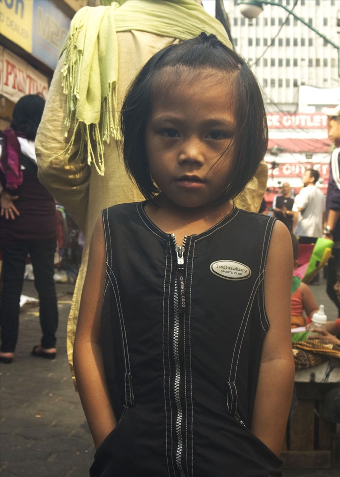 Casting a shadow of darkness upon men's children. (Quiapo, Manila, Philippines)