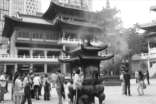 In a city which has seen a meteoric rise in economy and infrastructure, Shanghai is a mix of the old and the new as can be seen in this photo. People flock to the inner city temples on a daily basis to give thanks and pray as skyscrapers are built around the temple perimeter. 