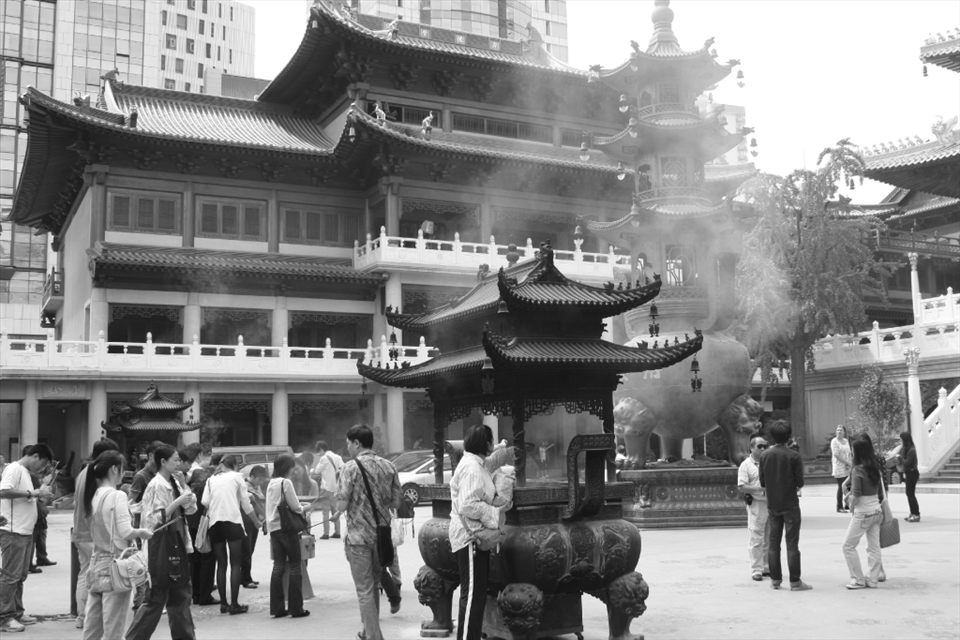 In a city which has seen a meteoric rise in economy and infrastructure, Shanghai is a mix of the old and the new as can be seen in this photo. People flock to the inner city temples on a daily basis to give thanks and pray as skyscrapers are built around the temple perimeter. 