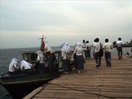 the students go to school and go home by traditional ship called 