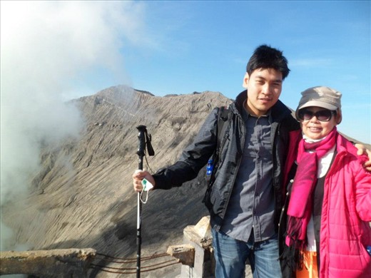 Stepping in the edge of Bromo after giving the best struggle. Win gave support to his mother for achieving the top of the crater. His mother was so exited when she could get into the top. 