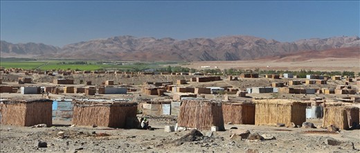 Township with houses made from river reeds, Norotshama.